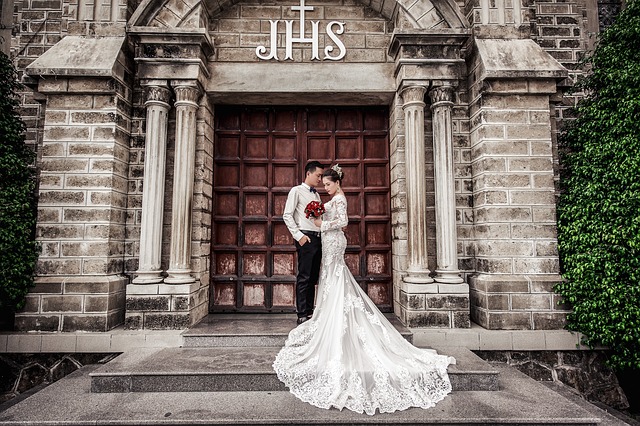 Newlyweds in front of a church