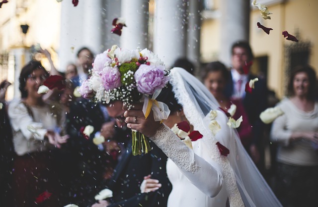 Newlyweds exiting a church