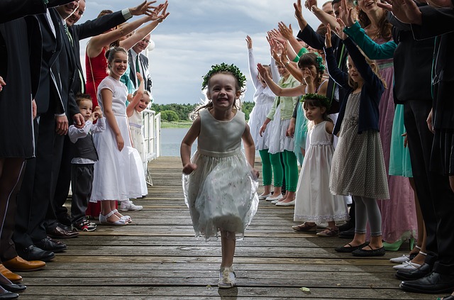 Flower girl walking down the aisle